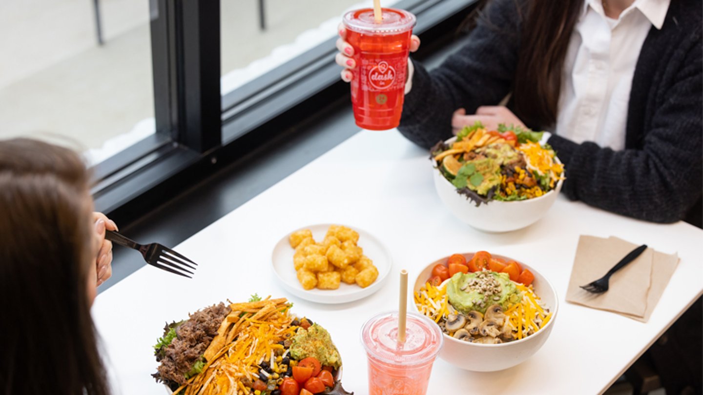 Customers eating salads at the new Dash In store in Loudoun County Virginia