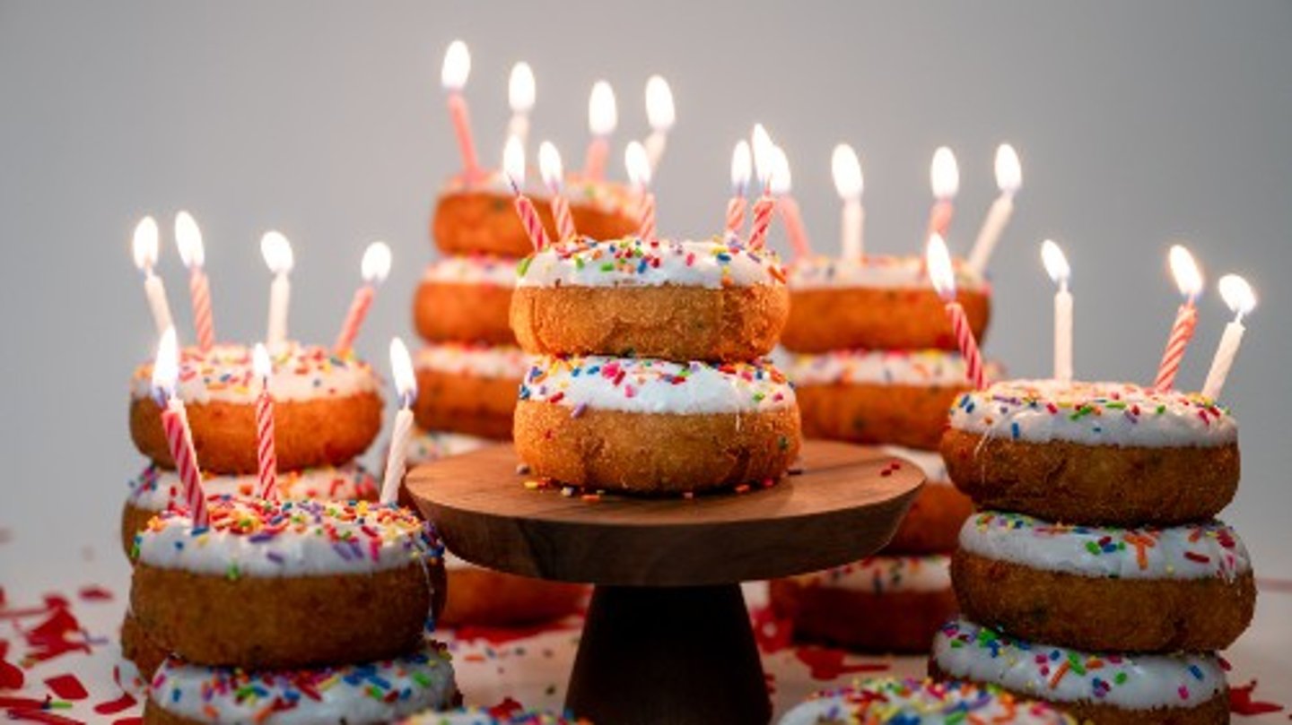 Maverik confetti cake donuts with birthday candles