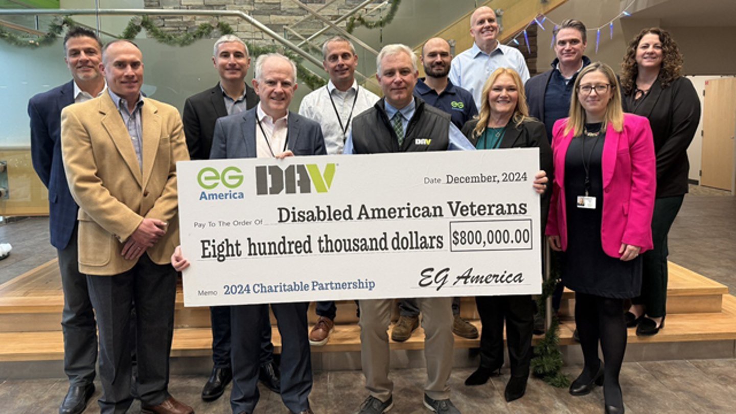 EG America presents a big check to representatives of the DAV