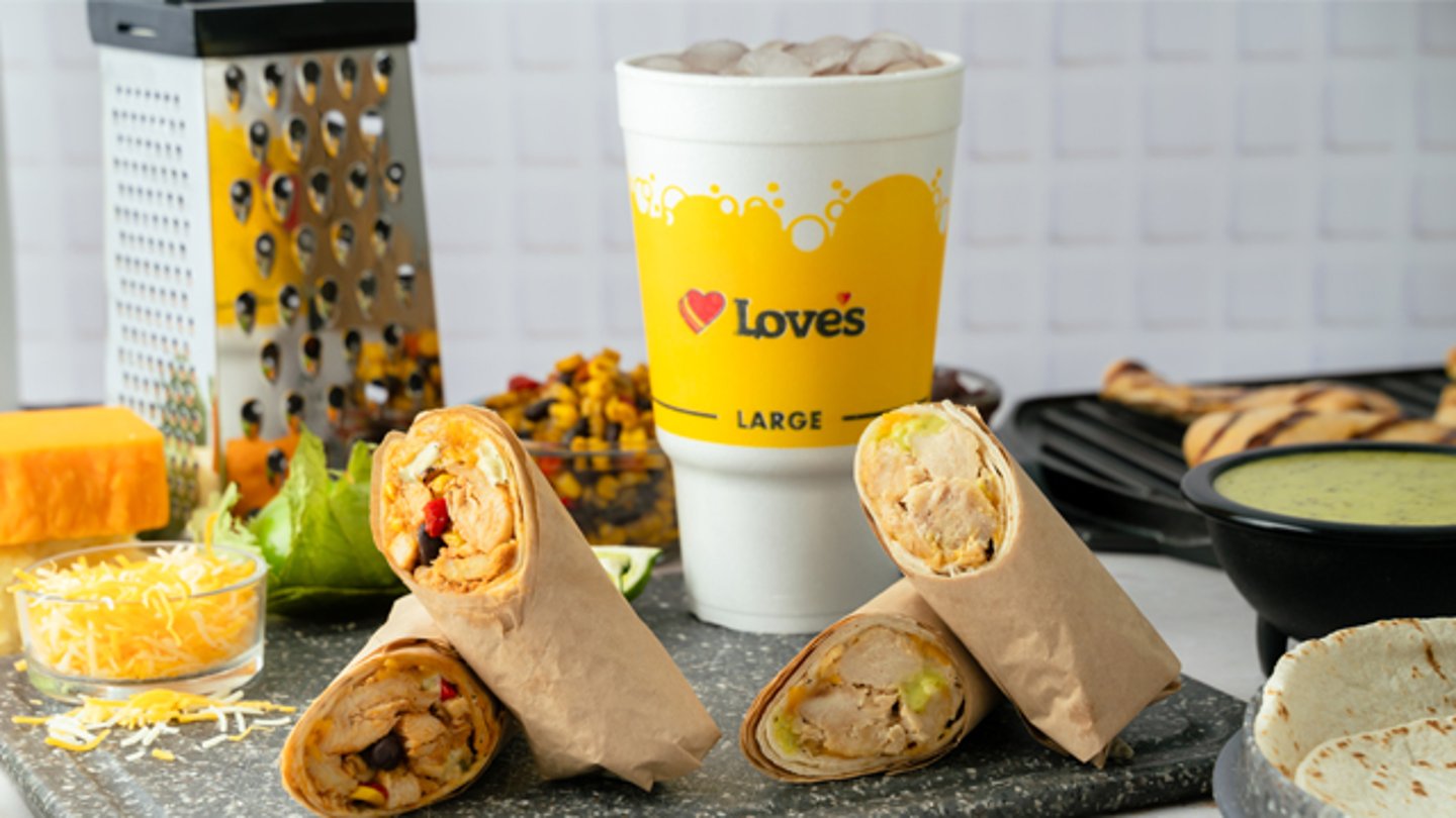 An array of Love's chipotle offerings like the chipotle chicken salad wrap