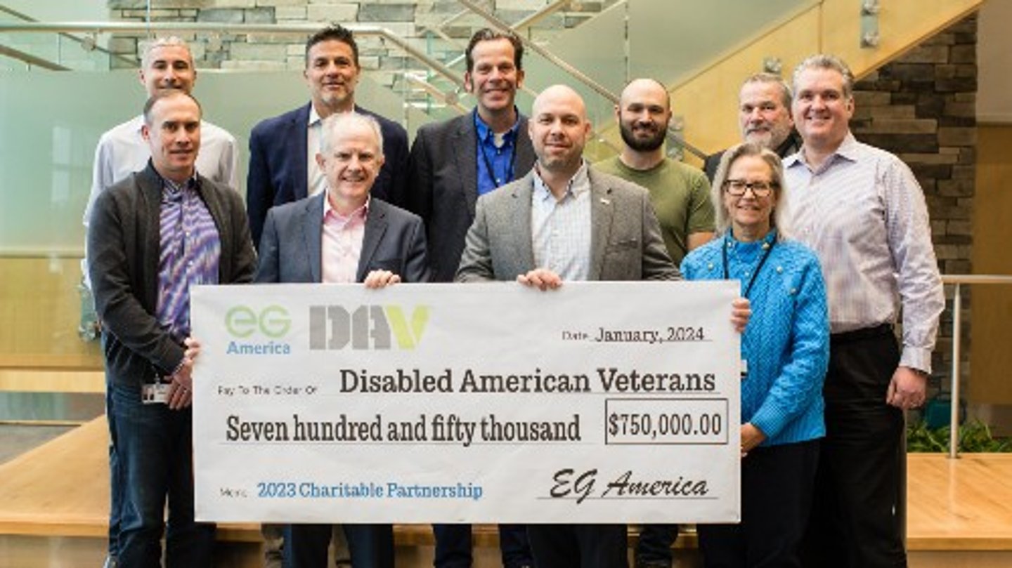 EG America leadership presents a donation check to Disabled American Veterans