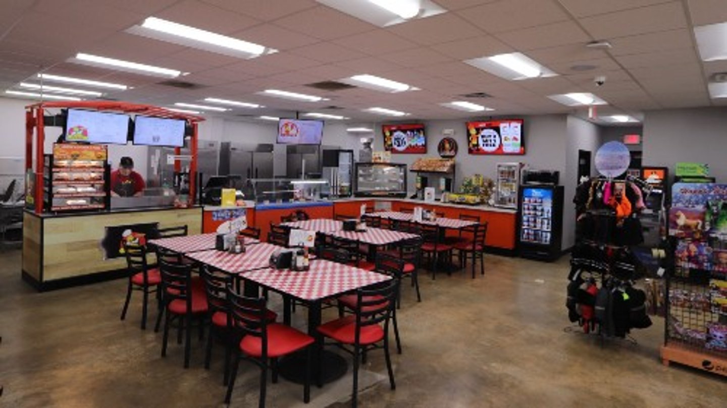 Interior seating area for Hot Spot convenience store