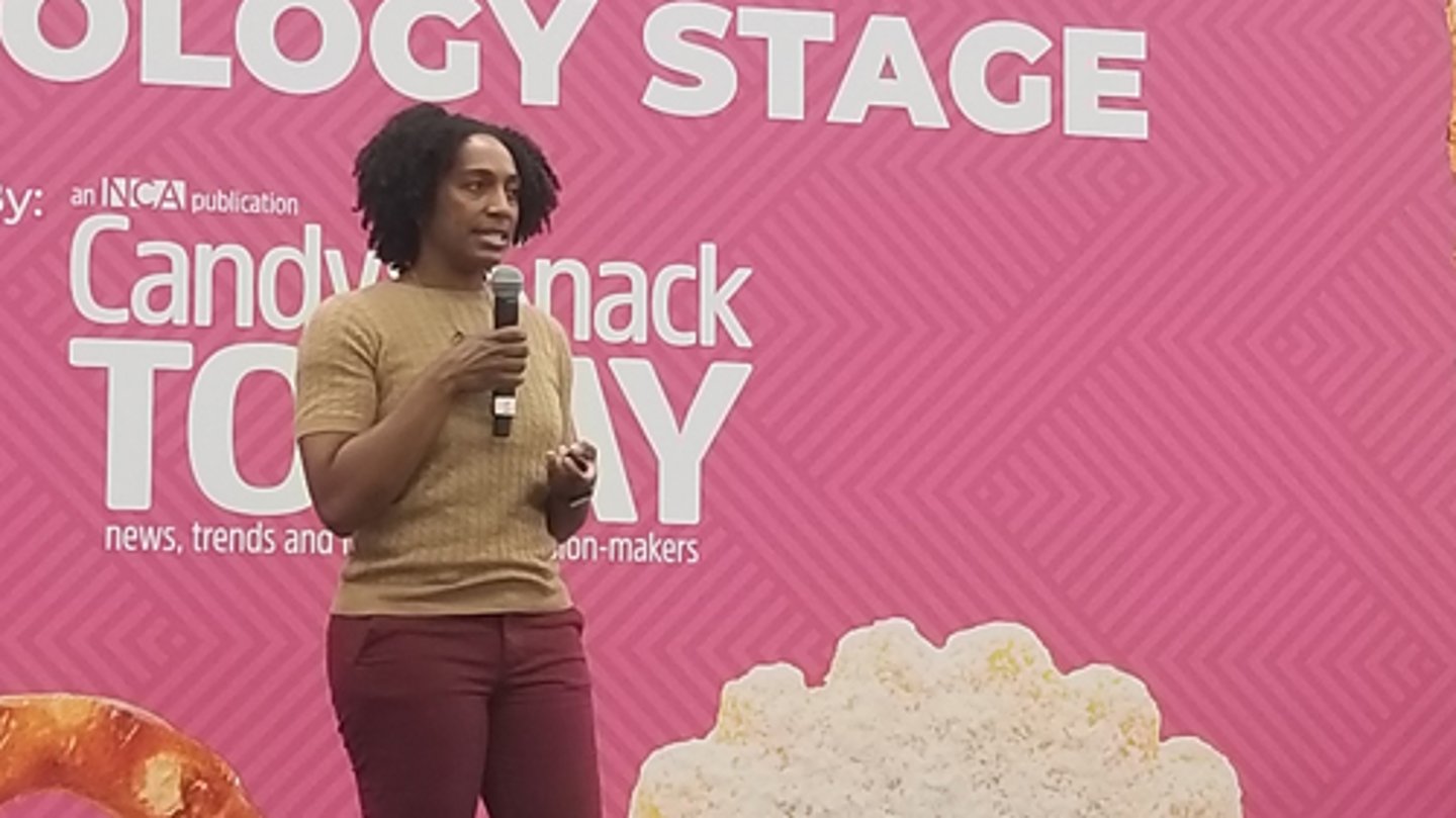 GSTV's Kristal Walton talking at the 2024 Sweets & Snacks Expo