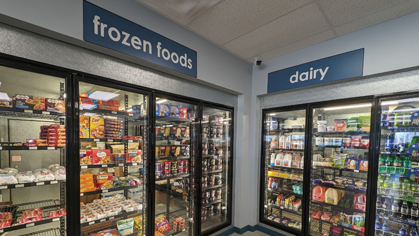 The frozen food and dairy coolers at Kumbha-Yah Cafe and EV Market Place