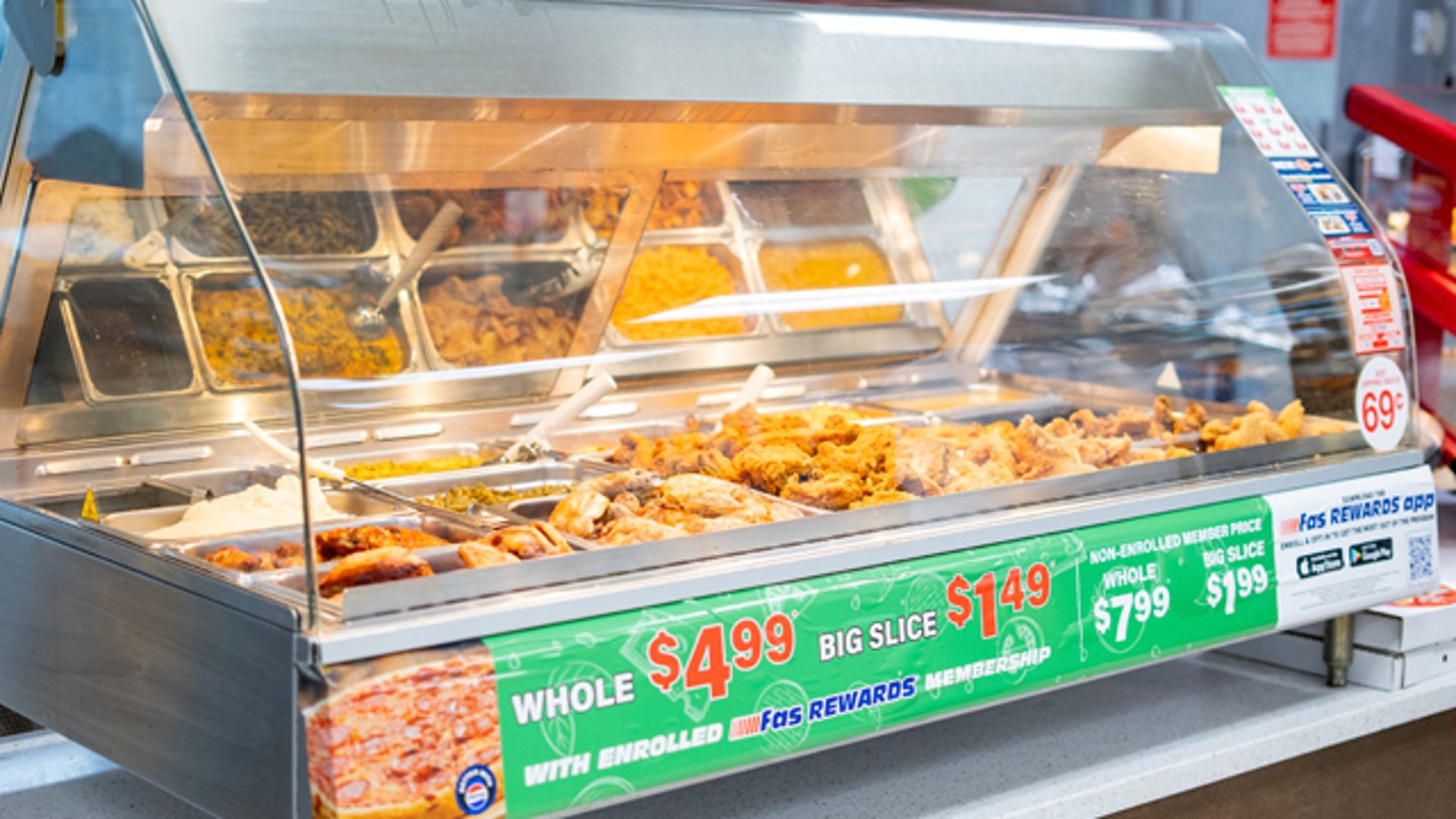 A hot food case at a fas mart convenience store