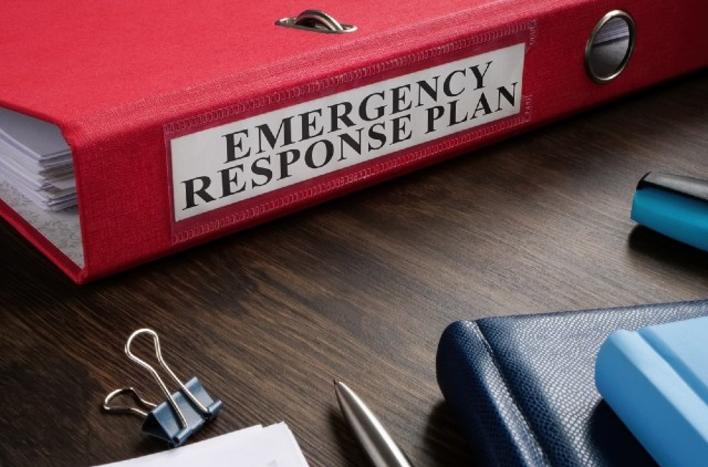 Binder with words emergency response plan on spine