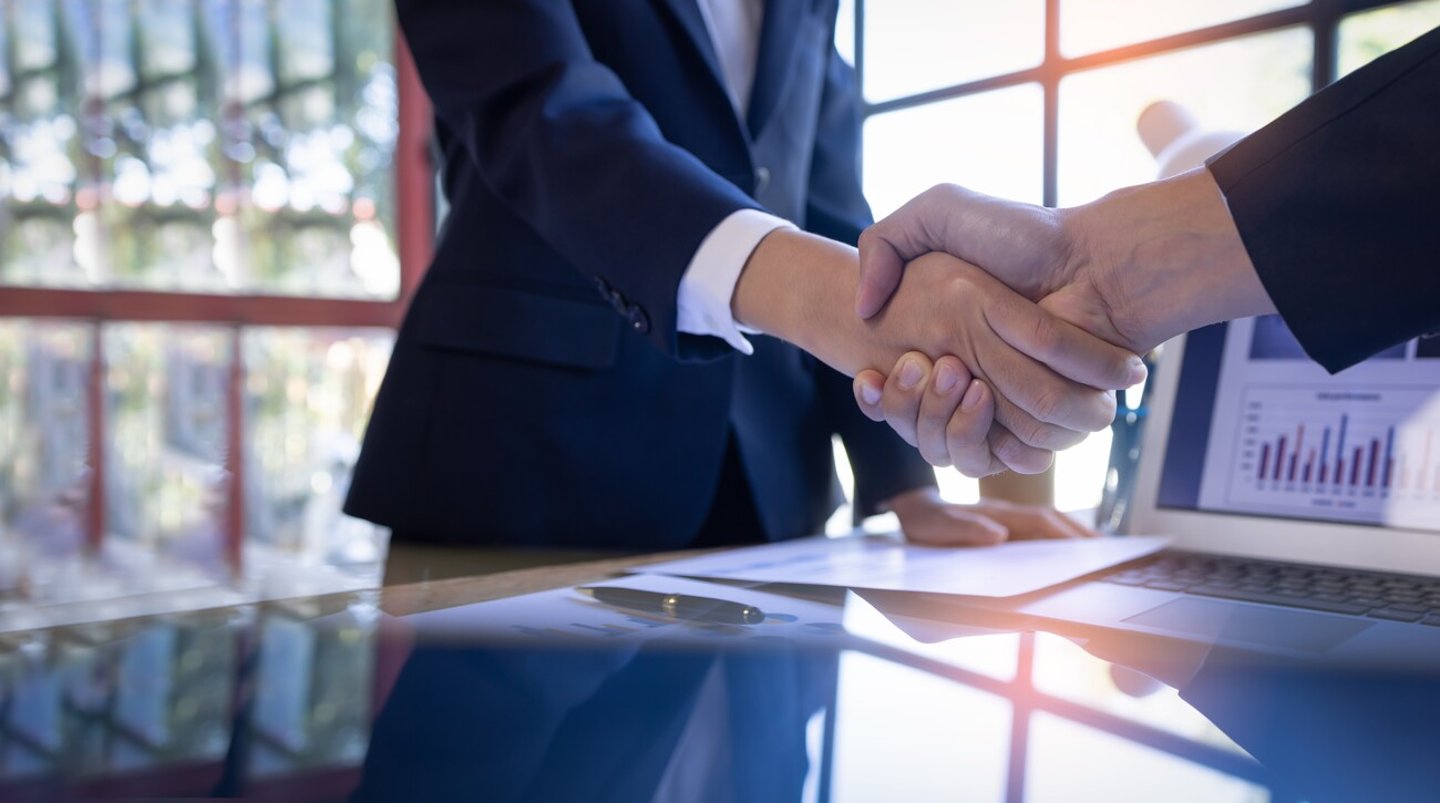 Business handshake for teamwork of business merger and acquisition,successful negotiate,hand shake,two businessman shake hand with partner to celebration partnership and business deal concept.; Shutterstock ID 2275357833